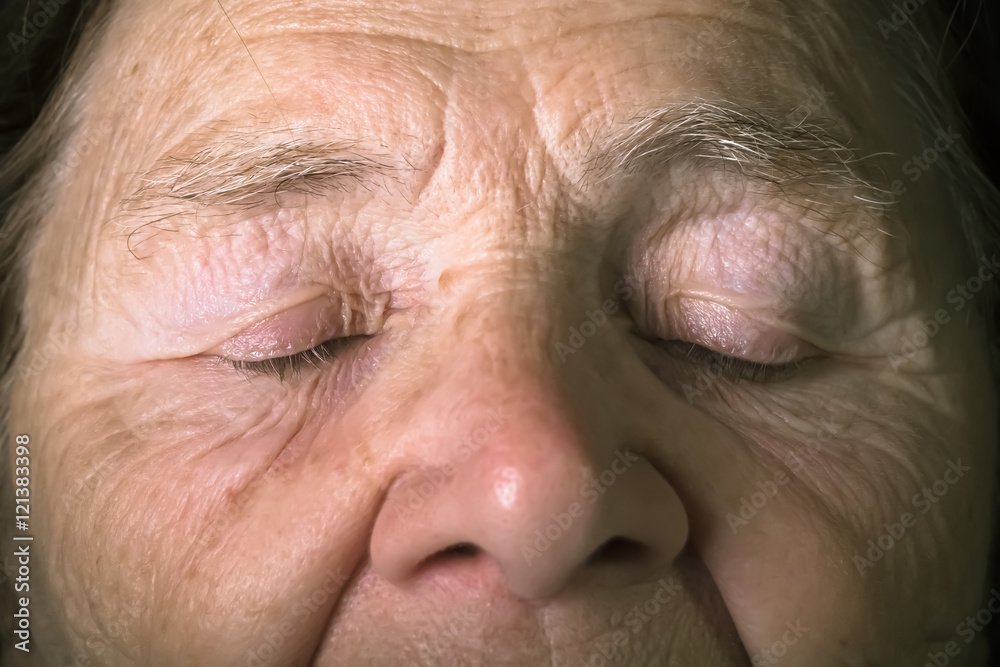 Portrait of elderly woman. Dreaminess. Toned