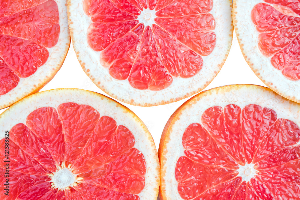 Bright and fresh grapefruit. Colorful citrus fruit slices background. White backside. Bright and fresh grapefruit. Colorful citrus fruit slices background. White backside.