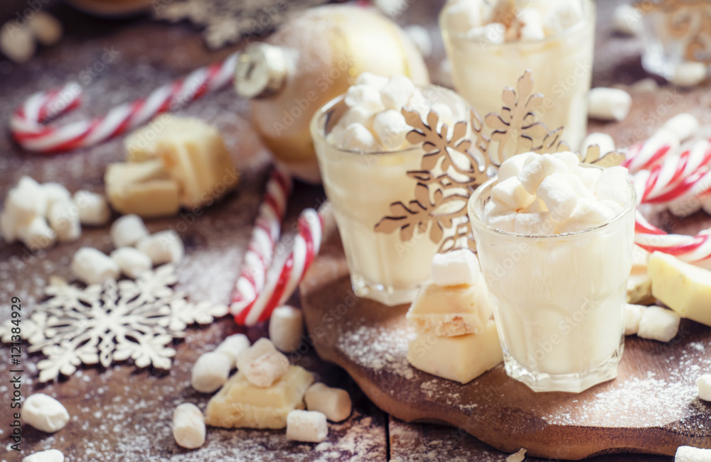 Hot white chocolate with marshmallows in a xmas decoration with Hot white chocolate with marshmallows in a xmas decoration with