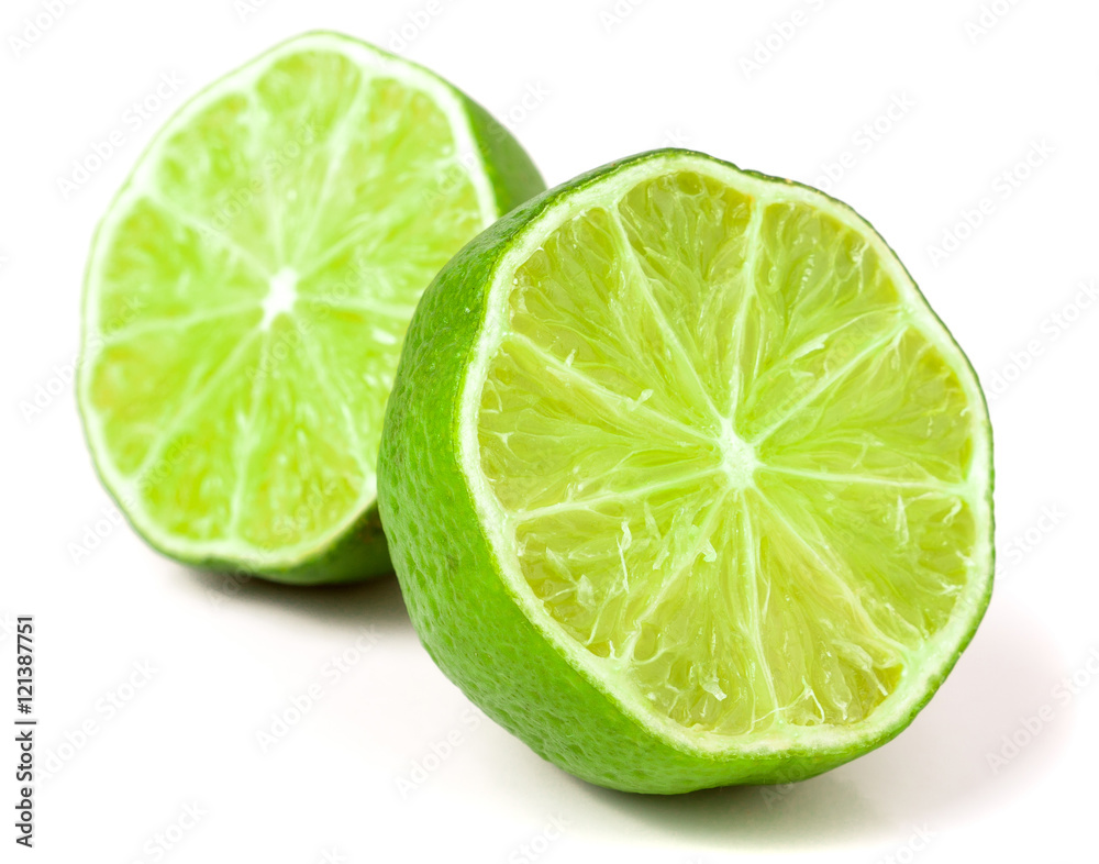 two Lime halves isolated on white background