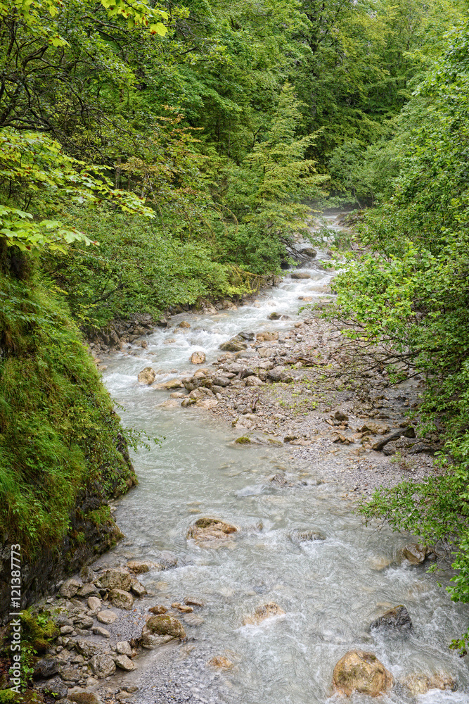 hiking through the Wolfsklamm gorge on stairs. European Alps. Pa hiking through the Wolfsklamm gorge on stairs. European Alps. Pa