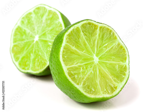 two Lime halves isolated on white background