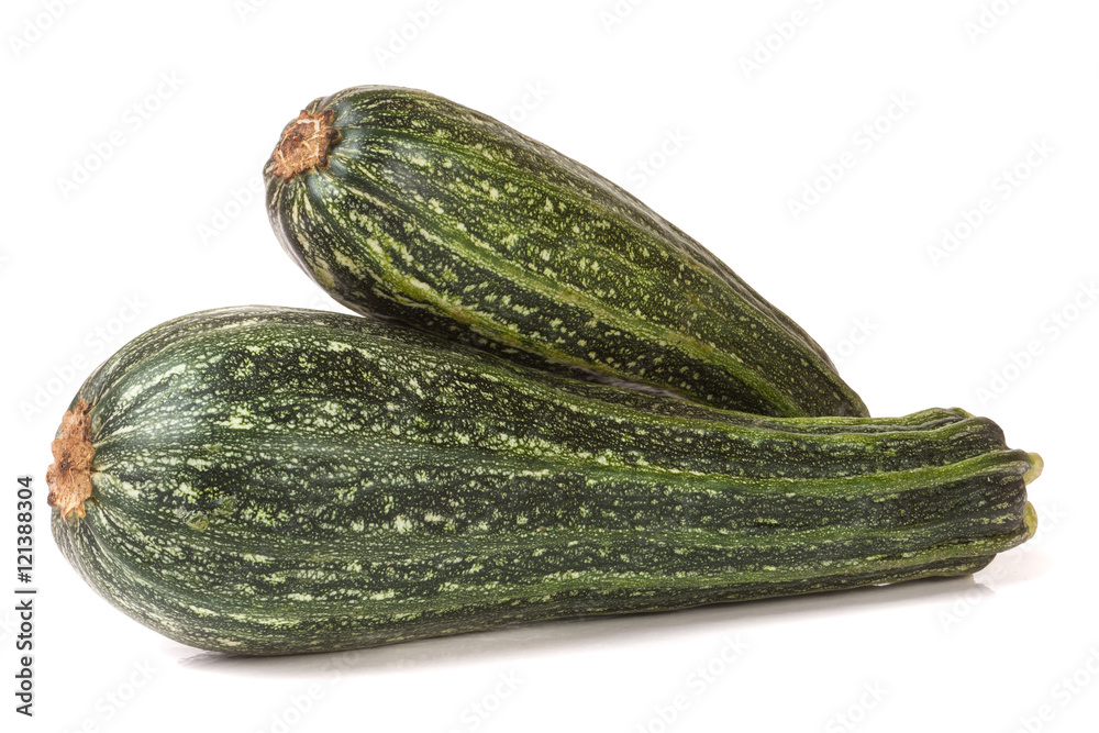 Two green zucchini isolated on white background Two green zucchini isolated on white background