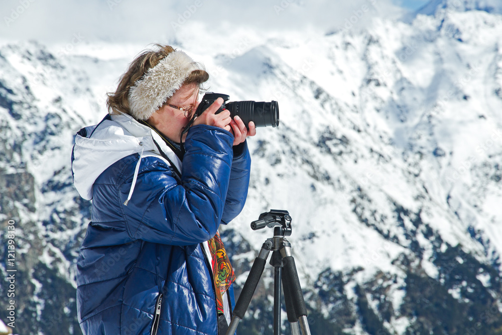 Girl photographer mountains