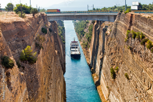 Ship cross The Corinth Canal that connects the Gulf of Corinth with the Saronic Gulf in the Aegean Sea. photo