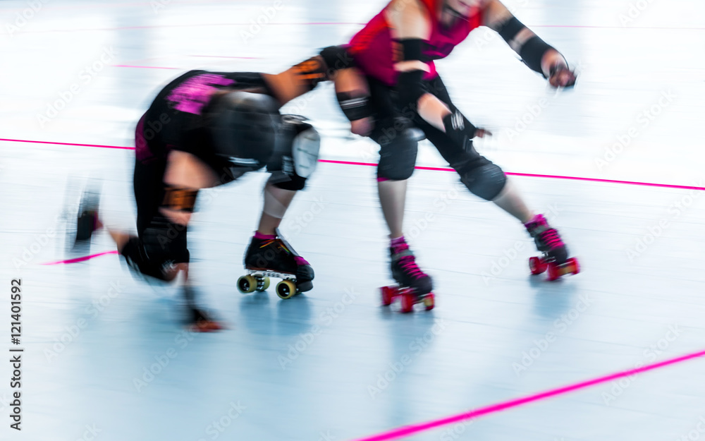 Roller derby skaters action blur. Motion pan shot at rink competition. Collision