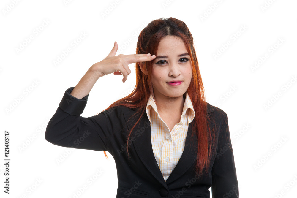 Beautiful young Asian woman holding fingers in gun gesture. Beautiful young Asian woman holding fingers in gun gesture.