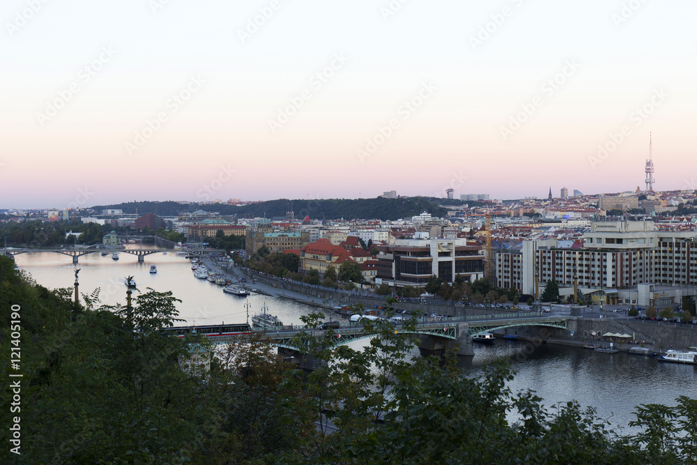 Evening Prague City with its Bridges and Towers above River Vltava, Czech Republic