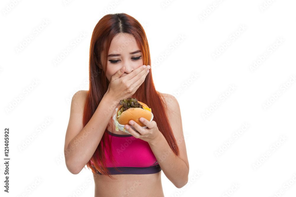 Beautiful Asian healthy girl enjoy eating hamburger. Beautiful Asian healthy girl enjoy eating hamburger.