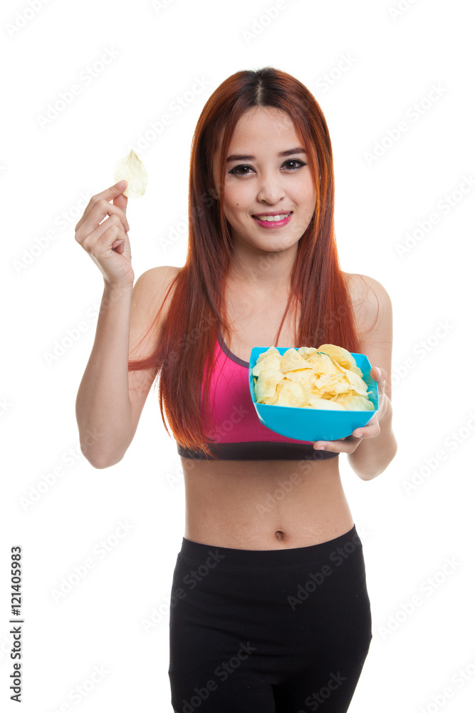 Beautiful Asian healthy girl eat potato chips. Beautiful Asian healthy girl eat potato chips.