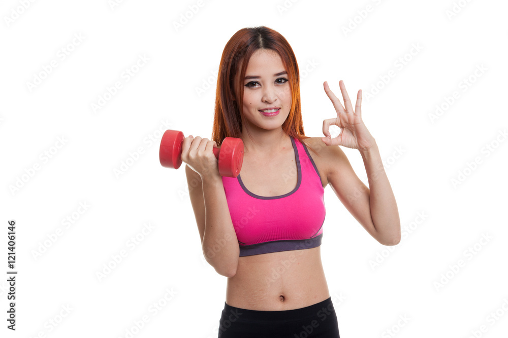 Beautiful Asian healthy girl show OK with dumbbell. Beautiful Asian healthy girl show OK with dumbbell.