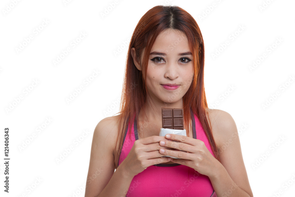 Beautiful healthy Asian girl love chocolate. Beautiful healthy Asian girl love chocolate.