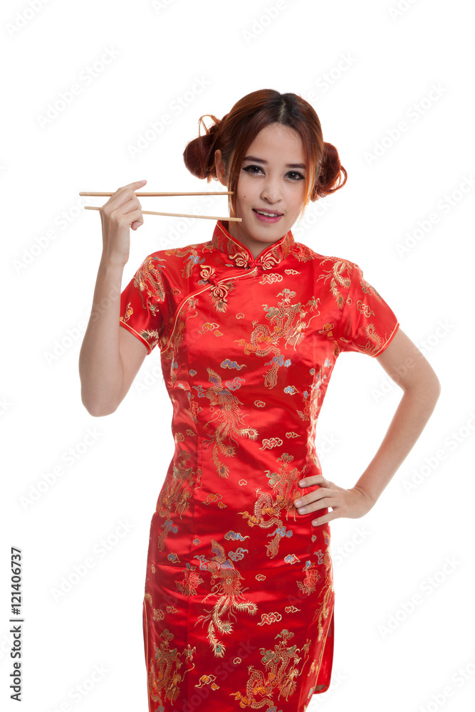 Asian girl in chinese cheongsam dress with chopsticks. Stock Photo | Adobe  Stock