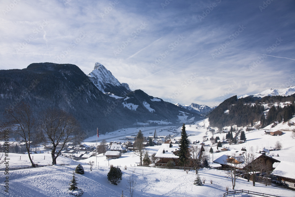 Landscape of Gstaad in Switzerland, with snow in winter