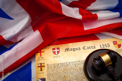 Union Jack and the Magna Carta (a symbol for human rights, democracy and free speech) next to a gavel photo