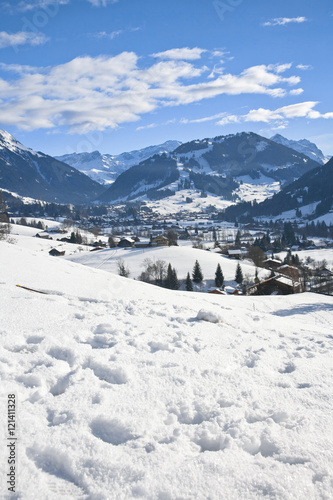 Landscape of Gstaad in Switzerland, with snow in winter