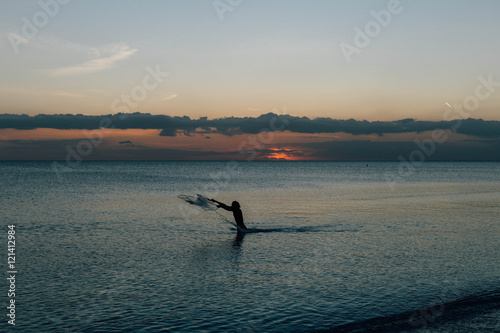Fishing in the ocean with a net