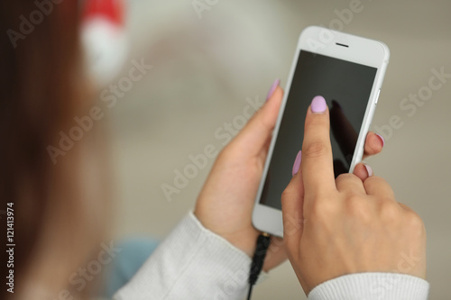 Girl holding smart-phone