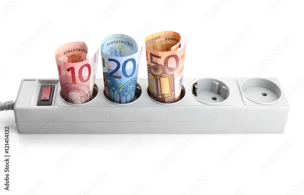 Fotografie Euro banknotes in power socket on white background