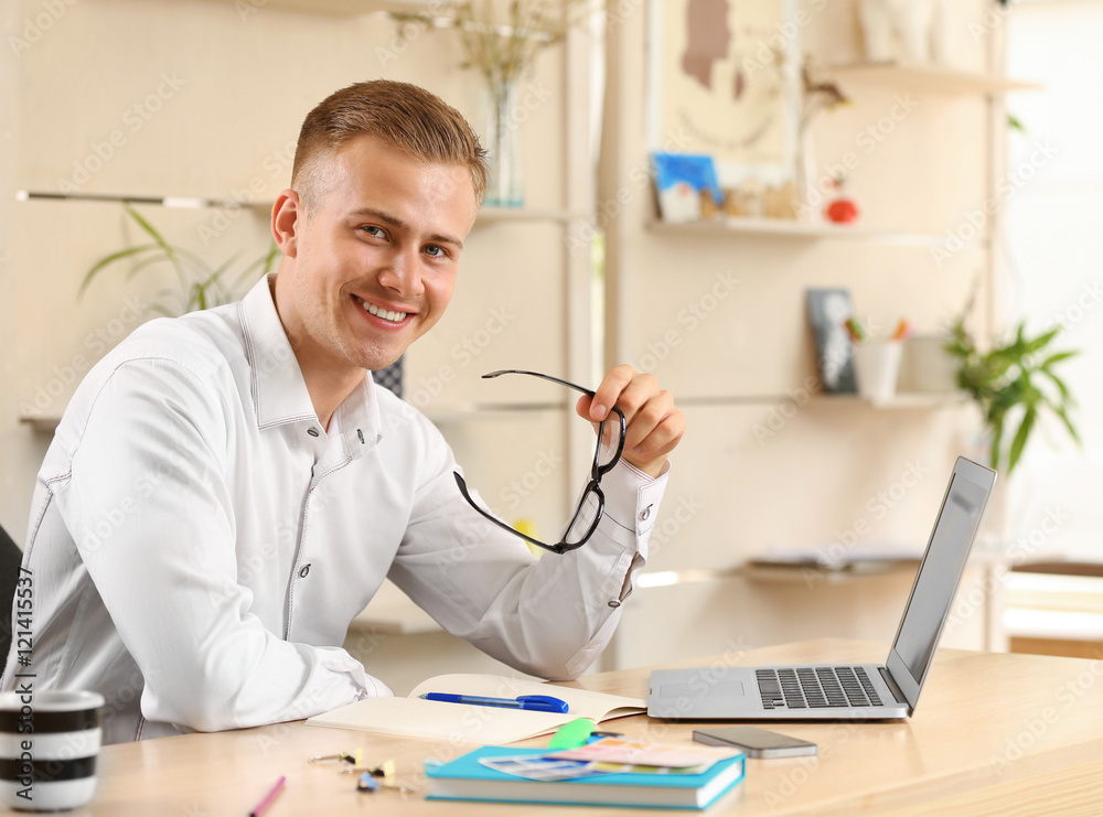 Young businessman working in office Young businessman working in office