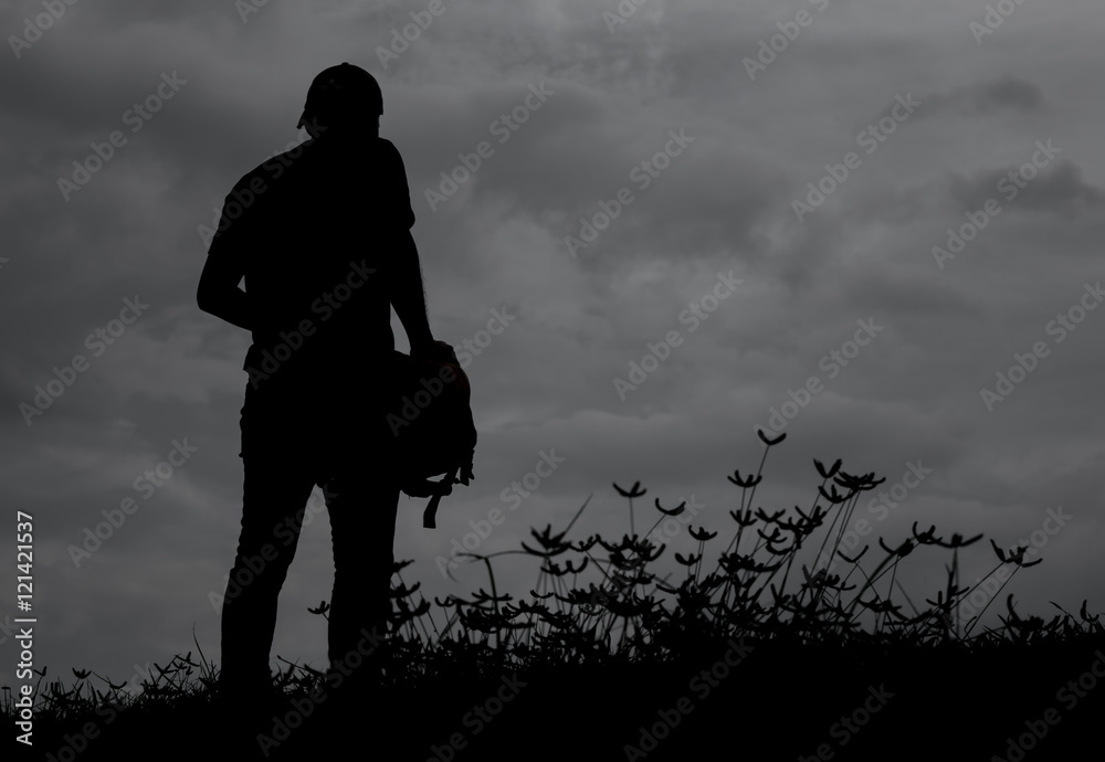 Siluate a man with grass Siluate a man with grass