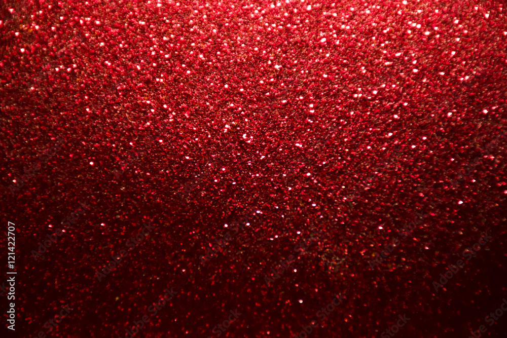 red and silver Sparkling Lights Festive background with texture. Abstract Christmas twinkled bright background with bokeh defocused lights and Falling stars. Winter background. Card or invitation.