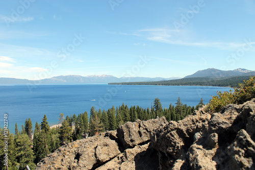 Lake Tahoe and Rocks Rocky hillside and trees overlooking Lake Tahoe