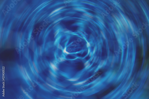 Spinning Water Whirlpool Effect Background in Blue