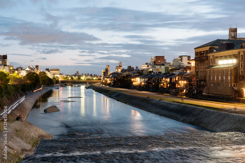  View of Kamo River at the centre of Kyoto  at Dusk.