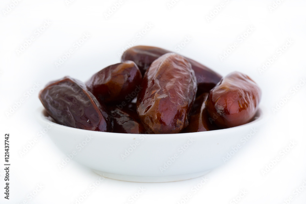 Sweet and healthy dates isolated on white background. Sweet and healthy dates isolated on white background.