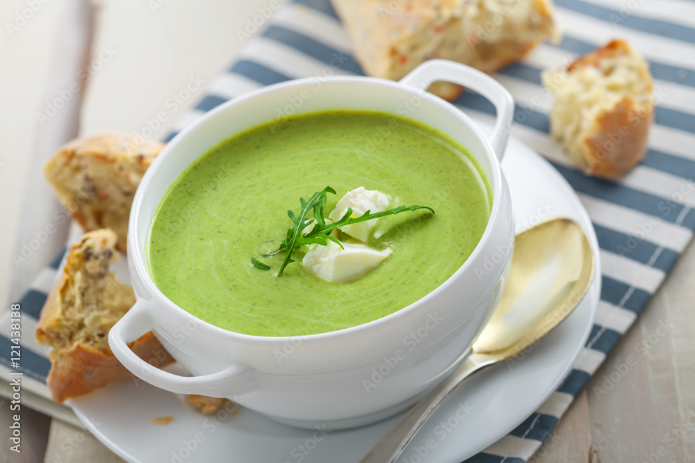 Delicious broccoli cream soup with rye bread . International cuisine meal. Delicious broccoli cream soup with rye bread . International cuisine meal.