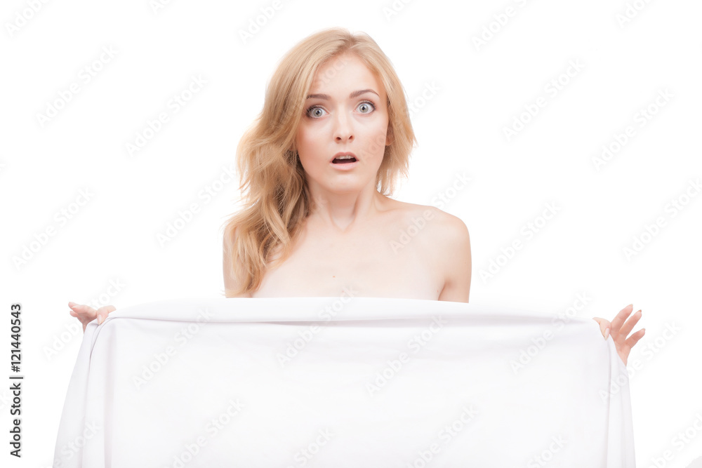 Obraz premium Portrait of naked blond covered with a white cloth on a white background