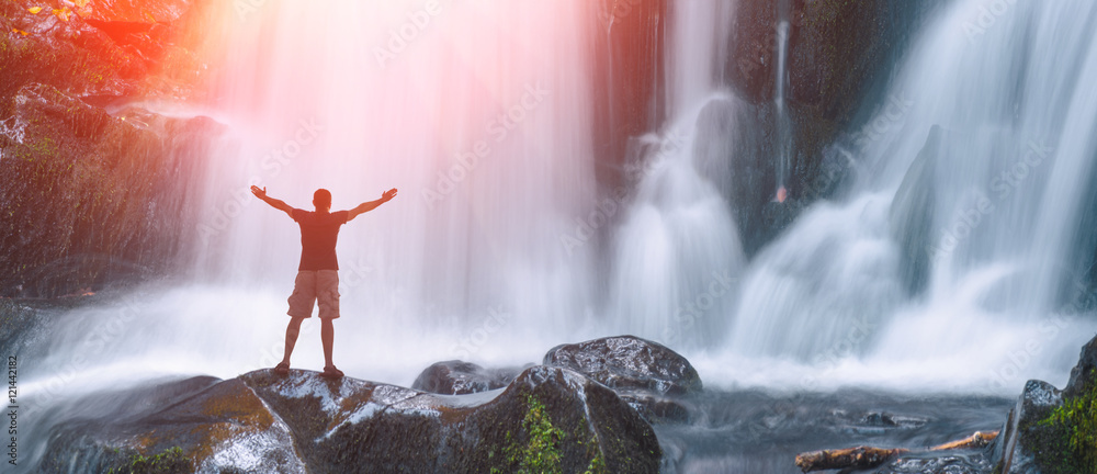 Man on a Great waterfall