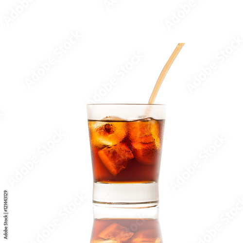 Cola pouring in a glass