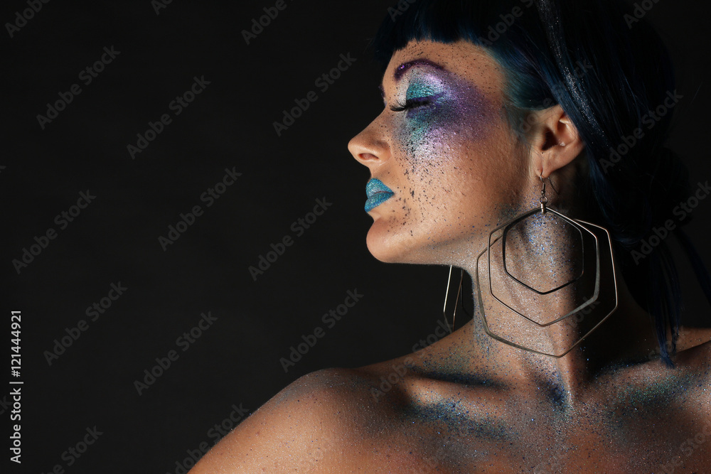 Portrait of Beautiful Woman with Glitter Makeup. 