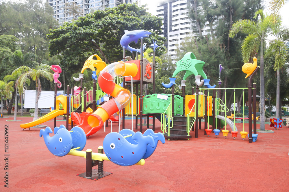 Stock Photo:.Colourful playground for children in public park Su