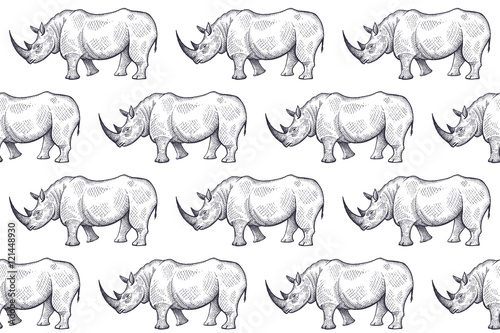 Seamless pattern with African rhinos.