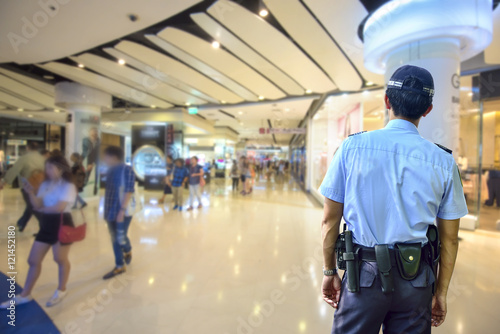 Fotografie, Obraz Security guard in shopping mall