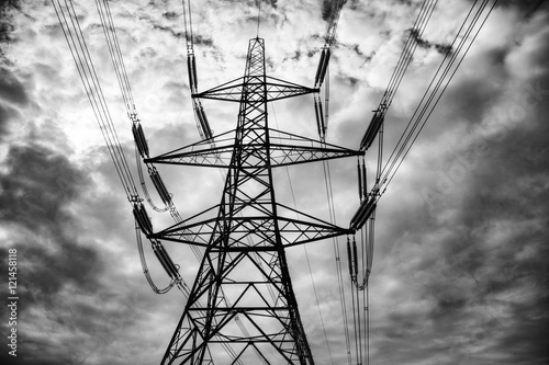 Electricity Pylon against clouds - Black and White