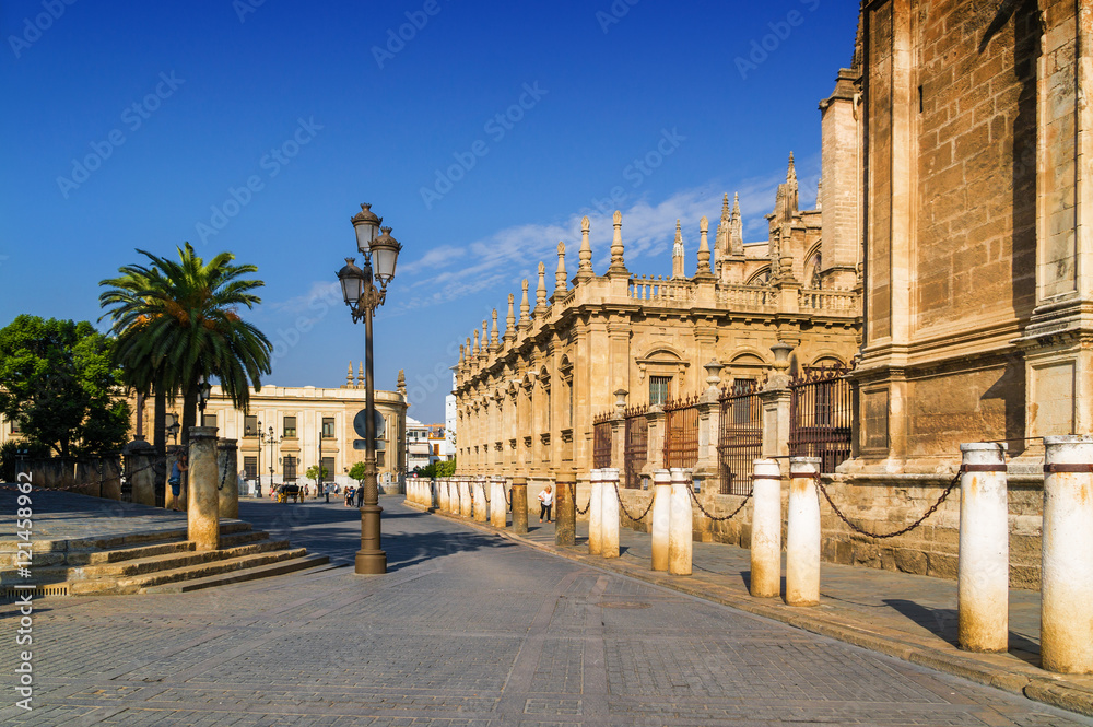 On the side of Cathedral and Giralda in Sevilla, Andalusia province, Spain.