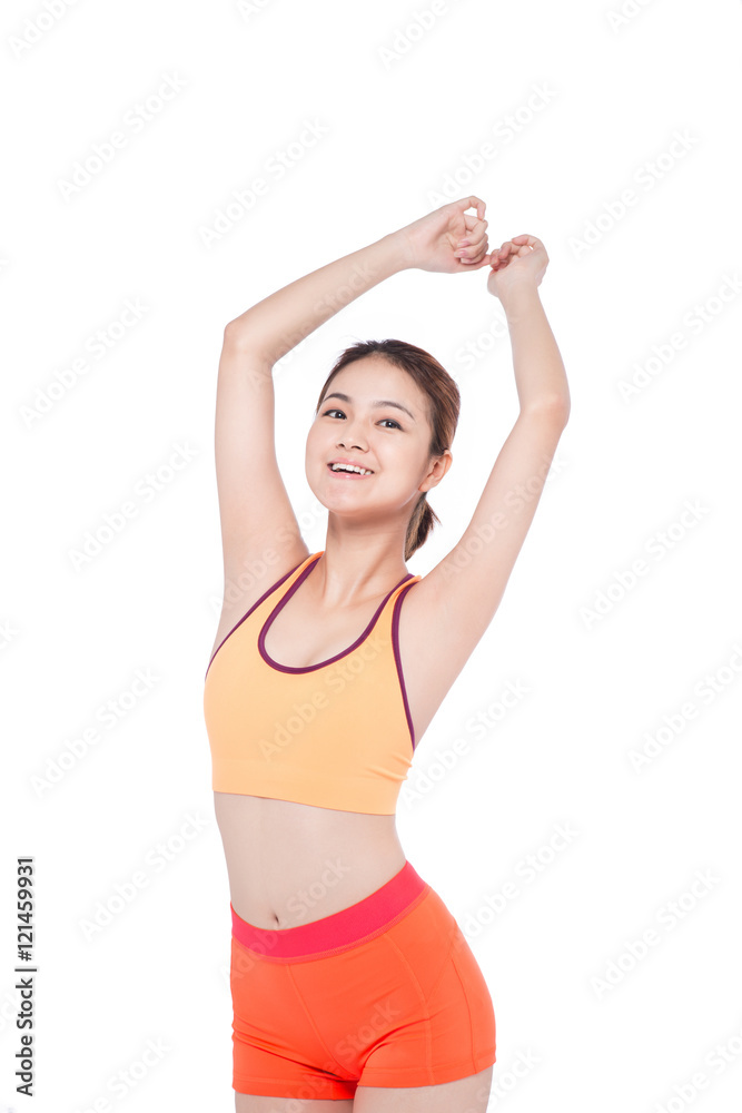 Weight loss concept. Cheerful young exercising woman, isolated o Weight loss concept. Cheerful young exercising woman, isolated o