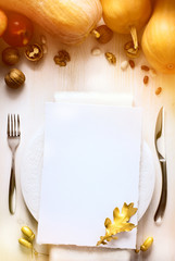 Art thanksgiving background with autumn Pumpkin on the dining ta