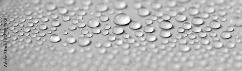 Condensation. Black and white background. Water drops reflection macro