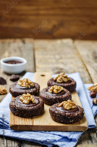 Raw vegan chocolate dates hazelnut cookies with chocolate frosti
