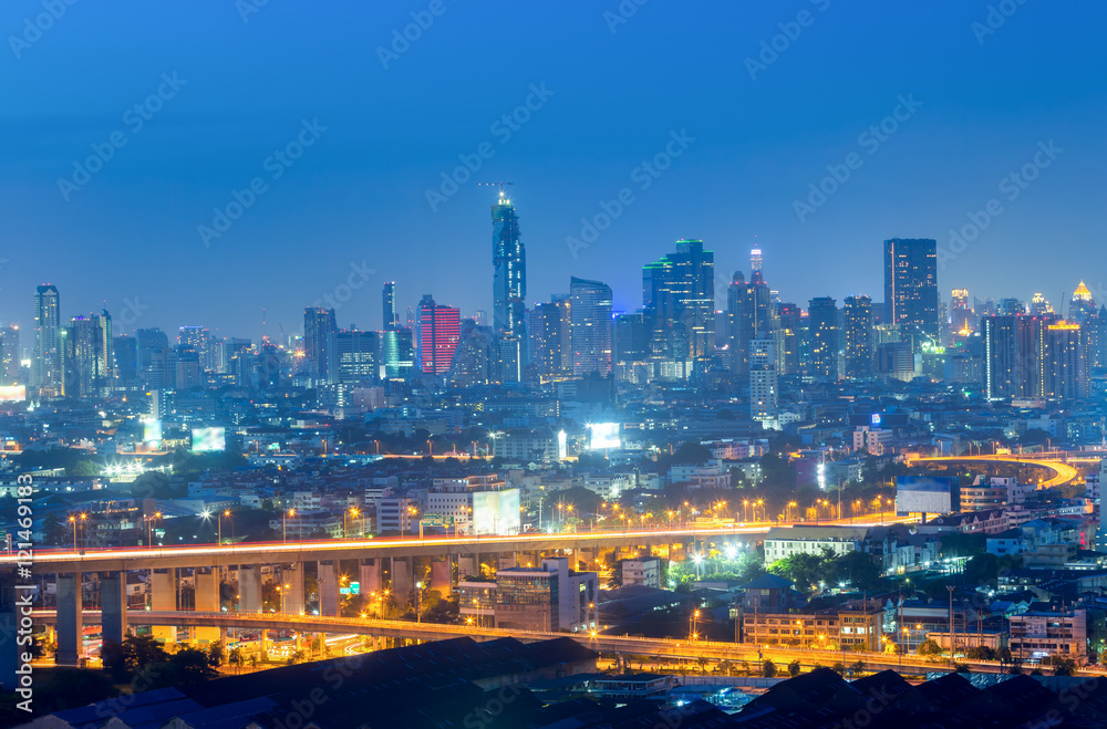 Aerial view of Bangkok modern office buildings, condominium in Bangkok city downtown with sunset sky , Bangkok , Thailand