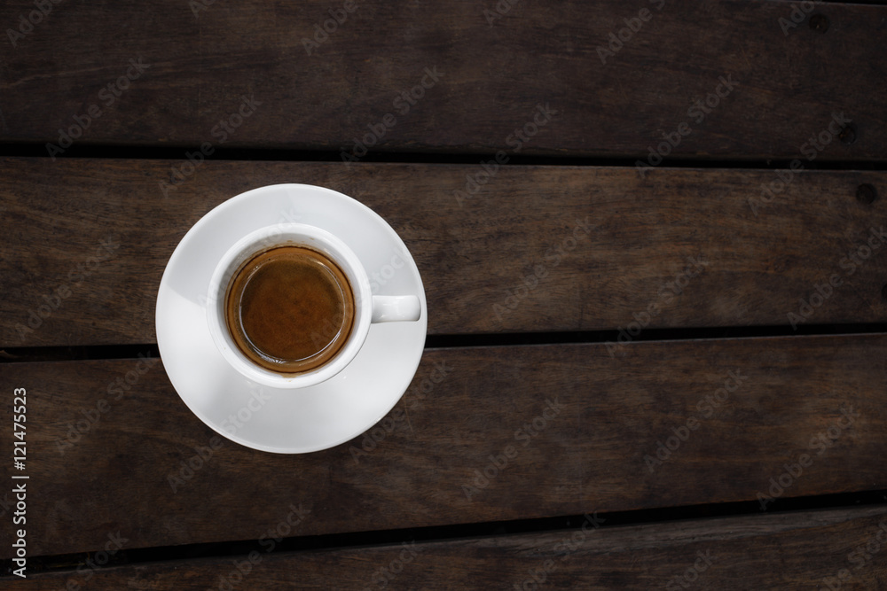 Cup of coffee espresso on a wooden background Cup of coffee espresso on a wooden background