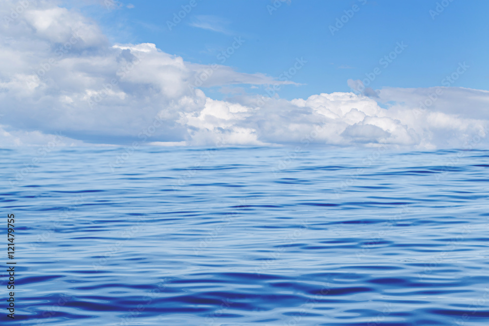 wave water of deep ocean meet the cloudy blue sky on day noon light. wave water of deep ocean meet the cloudy blue sky on day noon light.