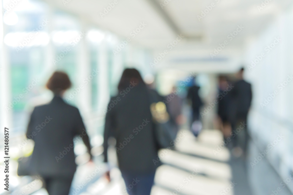 Blurred of people walking in the corridor of an business center, Blurred of people walking in the corridor of an business center,