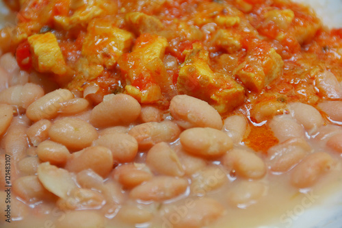 фотографія Common beans with chicken meat ' traditional peruvian food