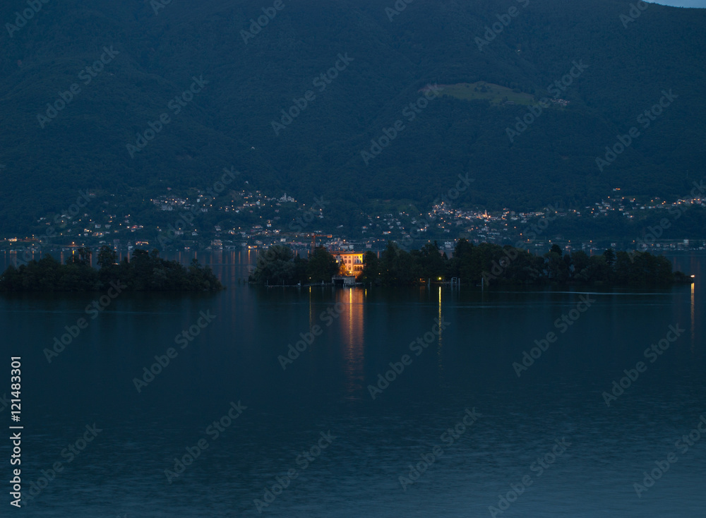 View on lake maggiore at daytime with the mountains in the background